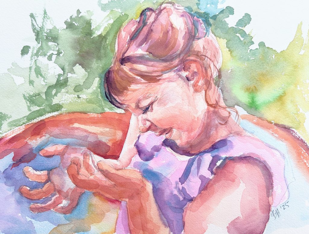 Little girl delighting in hot water in the summer. 